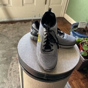 Skechers Relaxed Fit Air-Cooled Memory Form sneakers.